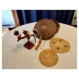Wooden Bird Sculpture and Woven Baskets