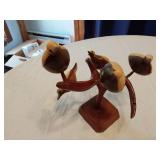 Wooden Bird Sculpture and Woven Baskets
