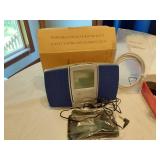 Assorted Electronics and Accessories including Flip Phones, Portable FM Scan Radio, TomTom GPS, and Digital Picture Viewer