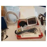 Assorted Electronics and Accessories including Flip Phones, Portable FM Scan Radio, TomTom GPS, and Digital Picture Viewer