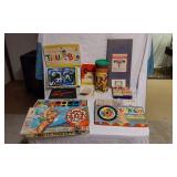 Board games including Annie Oakley Game, Tickle Bee, Monopoly, and Lincoln Logs
