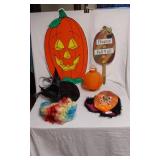 Halloween Decorations Including Pumpkin Sign, Witch Hat, and Mask