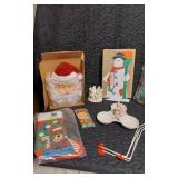 Vintage Christmas Decorations including Santa Wall Hanging, Snowman Countdown Calendar, and Assorted Holiday Items