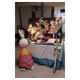 Easter and Spring Decoration Lot such as light-up bunny figures, floral arrangements, Easter baskets with eggs, and plush bunnies