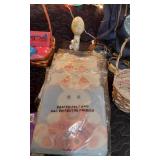 Easter and Spring Decoration Lot such as light-up bunny figures, floral arrangements, Easter baskets with eggs, and plush bunnies