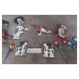 Wooden Lawn Ornaments Including Dogs, Flowers, and Birds