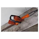 Remington Limb N Trim RM1425 Electric Chainsaw, Toro Electric Trimmer, and Black & Decker Hedge Trimmer