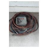 Extension cords, grease gun, and air hoses with accessories