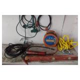 Extension cords, grease gun, and air hoses with accessories