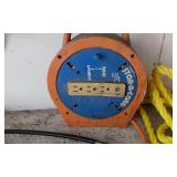 Extension cords, grease gun, and air hoses with accessories