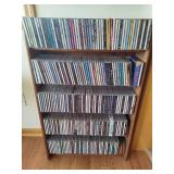Wood CD Storage Tower Filled with CDs Wood CD Storage Tower Filled with CDs