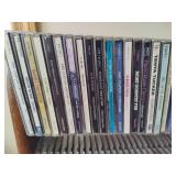 Wood CD Storage Tower Filled with CDs Wood CD Storage Tower Filled with CDs
