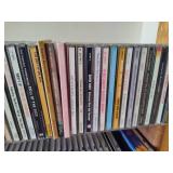 Wood CD Storage Tower Filled with CDs Wood CD Storage Tower Filled with CDs