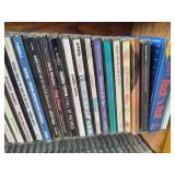 Wood CD Storage Tower Filled with CDs Wood CD Storage Tower Filled with CDs