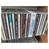 Wood CD Storage Tower Filled with CDs Wood CD Storage Tower Filled with CDs