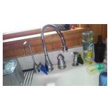 Cabin Teardown:   Kitchen Cabinets, Counter, Sink, Walls, Window, Stove, Ceiling Fan.