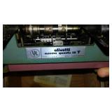 Royal Portable Typewriter And Olivetti Adding Machine.