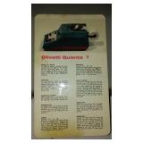 Royal Portable Typewriter And Olivetti Adding Machine.