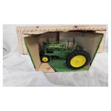 1:16 Ertl 1934 John Deere Monel "A" Unstyled Tractor with a Narrow Front