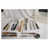 Kitchen Utensils and Tupperware Container