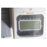 Electric Time Clock, time card slot and time cards.