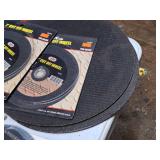 (2) 14" Steel Cut-off Blades (one new, one used), (2) 7" Cut-Off Wheel (new) and (1) 7" Universal (new)
