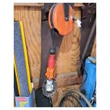 Hand Saw and Work Light on Reel