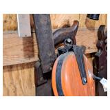 Hand Saw and Work Light on Reel