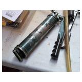 (4) Grease Guns and (1) Pump