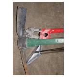 Group of Hand Tools Including Pickaxe, Bolt Cutters, and Post Driver