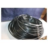 Coil of Black Polyethylene Tubing Approx. 100 Feet