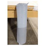 Partial Roll of Black and Gray Vinyl Sheet Material