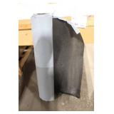 Partial Roll of Black and Gray Vinyl Sheet Material