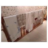 Several Pretty Table Cloths Several Pretty Table Cloths