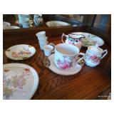Shelf of Misc. China Tea Cups, Cream & Sugar Bowls, Etc Shelf of Misc. China Tea Cups, Cream & Sugar Bowls, Etc