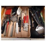 Drawer of Kitchen Tools: Spatulas, Tongs, Scrapers, Etc