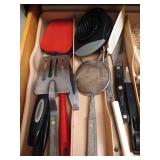 Drawer of Kitchen Tools: Spatulas, Tongs, Scrapers, Etc