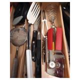 Drawer of Kitchen Tools: Spatulas, Tongs, Scrapers, Etc