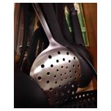 Drawer of Kitchen Tools: Spatulas, Tongs, Scrapers, Etc