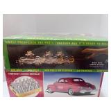Two New Sealed Models: Compact Pussy Cat and 1941 Plymouth