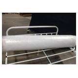 Unopened Rolled Mattress in Plastic Packaging