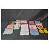 Collection of Kitchen Towels, Potholders, and Utensils Collection of Kitchen Towels, Potholders, and Utensils