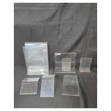 Lot of Display Stands, Picture Frames, and Cork Board Frames