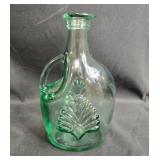 Set of Green Embossed Glass Bottles with Corks and Vintage Tupperware Container