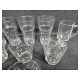 Set of Assorted Clear Glass Drinking Glasses and Mugs