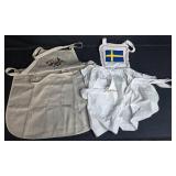 Set of 2 Aprons with Embroidery and Swedish Flag Motif