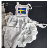 Set of 2 Aprons with Embroidery and Swedish Flag Motif