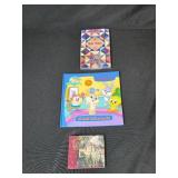 Collection of Books, Puzzles, and Game Board with Wooden Checkers