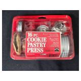 Vintage Baking and Pastry Tool Collection with Cookie Presses, Decorating Tips, and Swedish Sandbakelser Forms