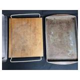 Collection of Baking Sheets, Round Cake Pans, and Wood Cutting Board Collection of Baking Sheets, Round Cake Pans, and Wood Cutting Board
